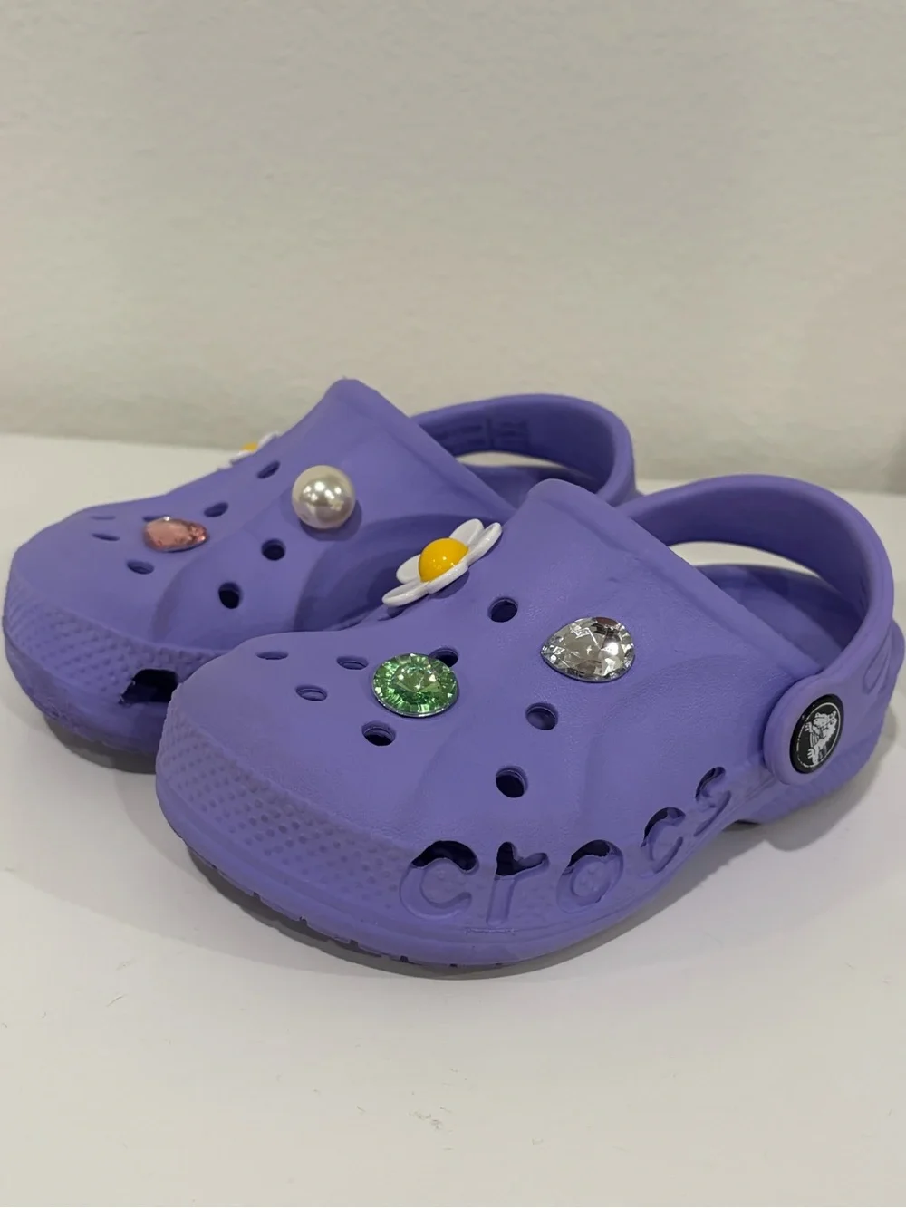 Girls size 9 toddler. Purple CROCS  Great Condition! Charms included